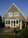 The back of the house just after we moved in - complete with grotty conservatory
